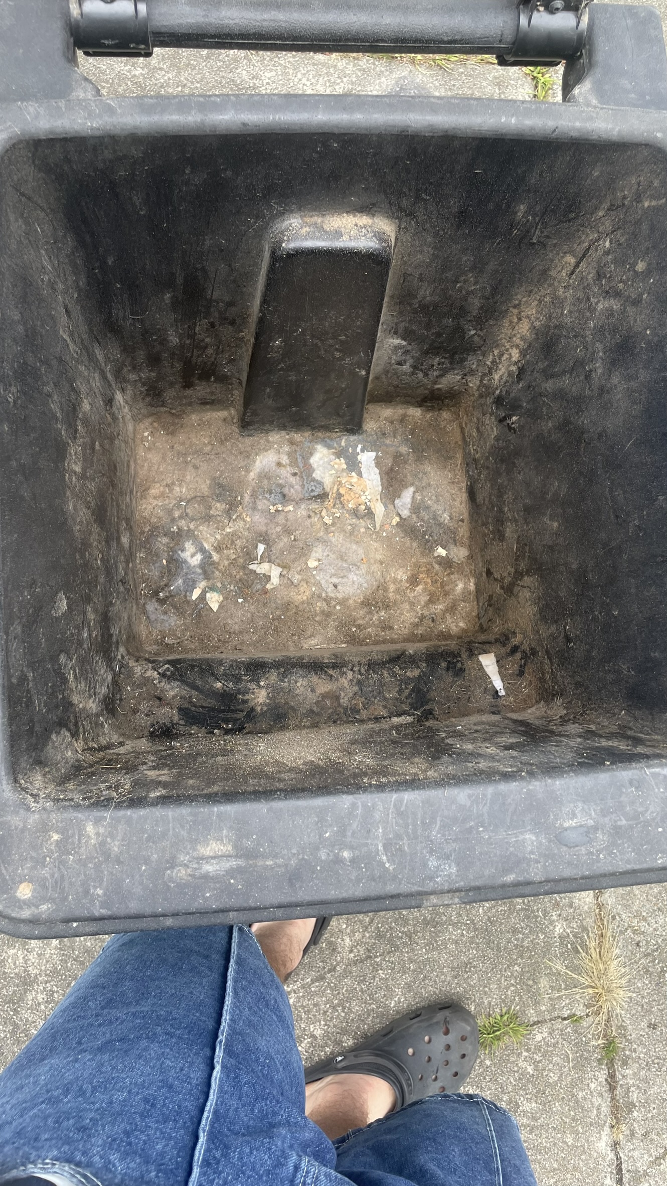 Dirty Black Trash Bin